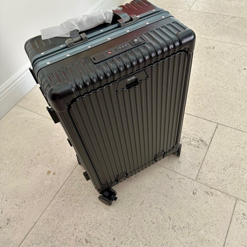 NOBL carry on spinner NEW IN BOX